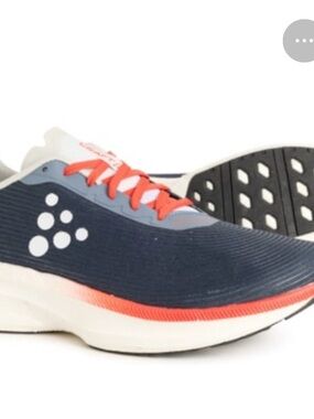 Craft athletic shoes in white with coral trim